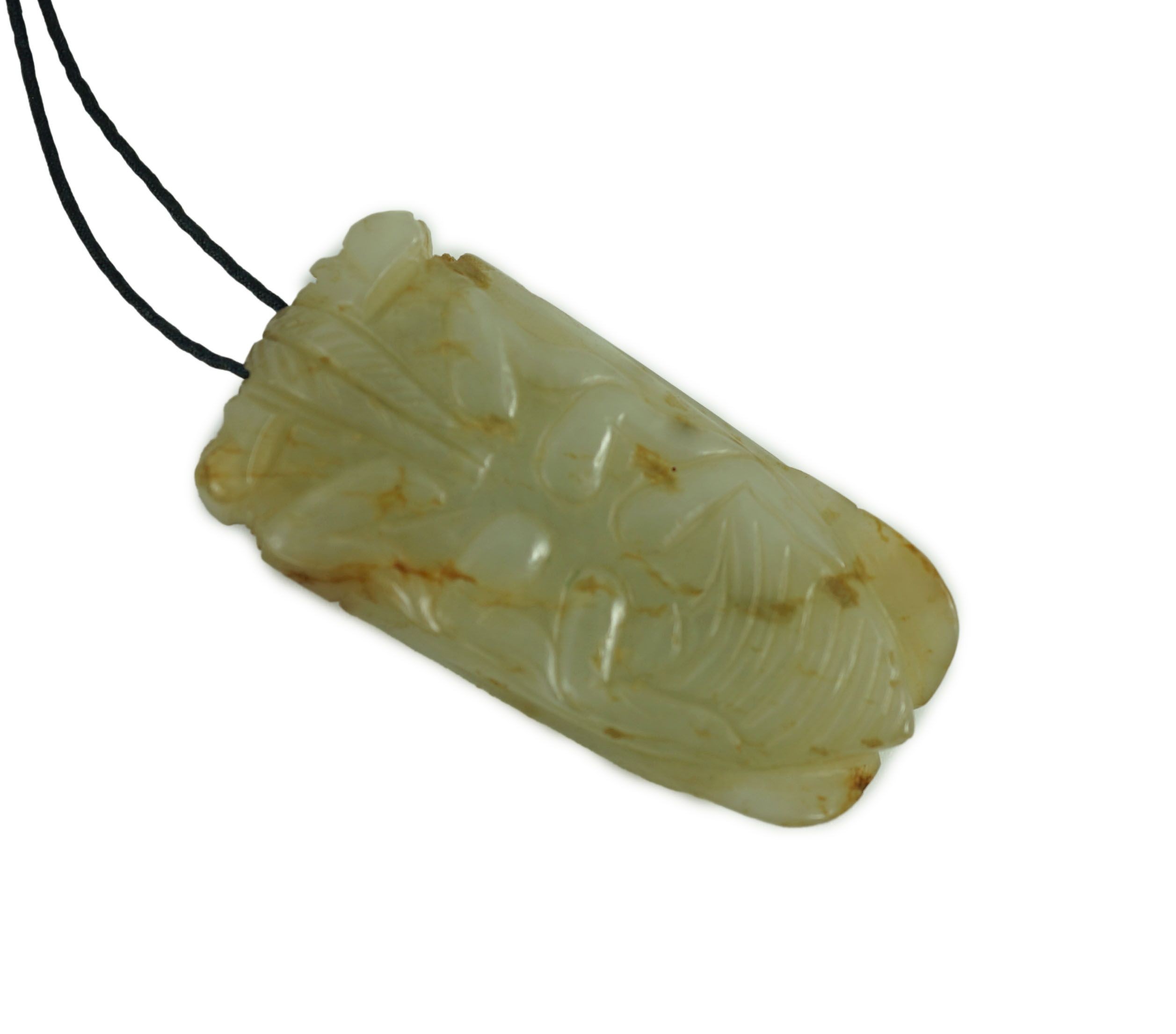 A Chinese pale celadon jade model of a cicada, 19th century, Cicada 5cms long. 4.9cm long